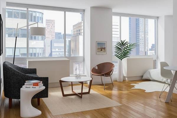 No Broker Fee + 1 Month Free Rent!!!  Limited Time Only!!!   Sprawling Midtown East Alcove Studio Apartment with 1 Bath featuring a Fitness Center and Rooftop Deck