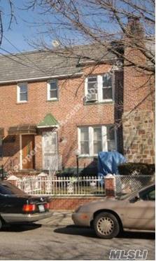 This Attached Two Family House Sits On 95th Street Between 23rd Ave And 24th Ave In East Elmhurst.