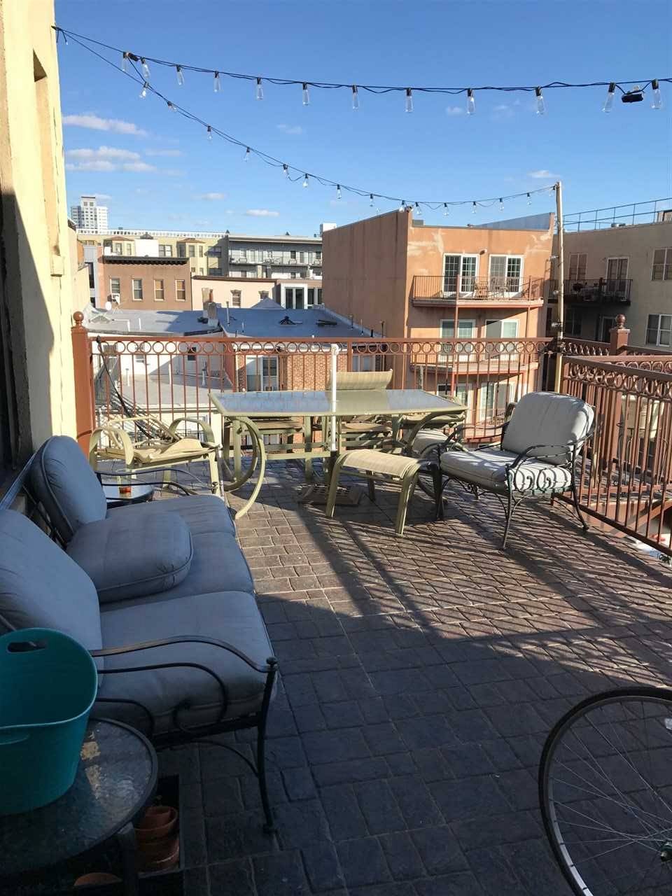 Outdoor space galore & beautiful renovation in this large condo