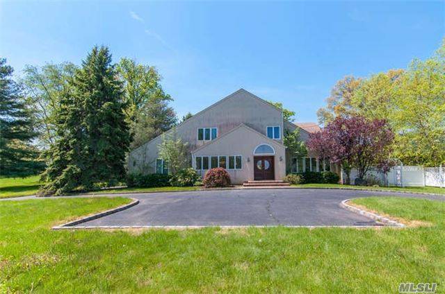 Spacious Colonial On Shy 1 Acre Property .
