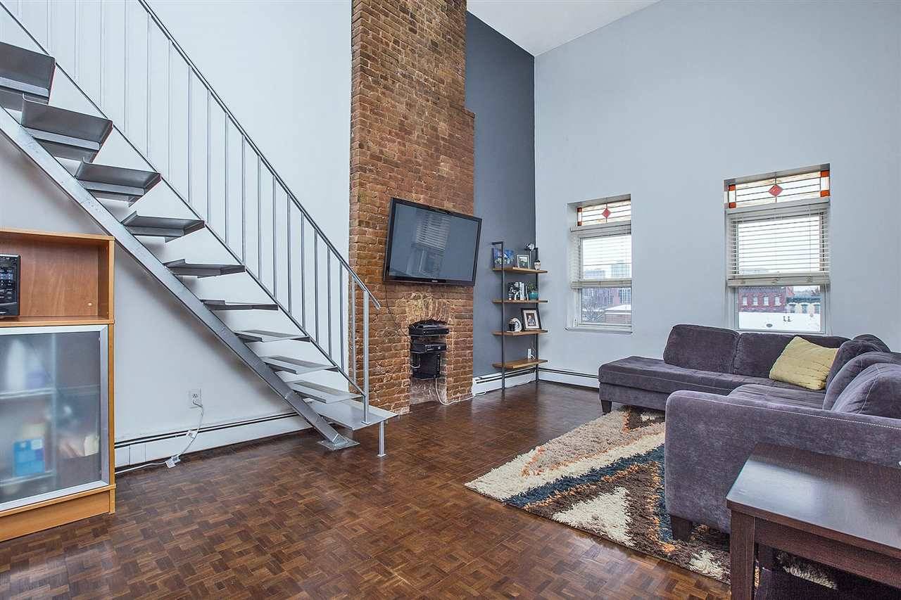 Welcome home to this artsy 1 Bed/ 1 Bath with loft with soaring 16 ft