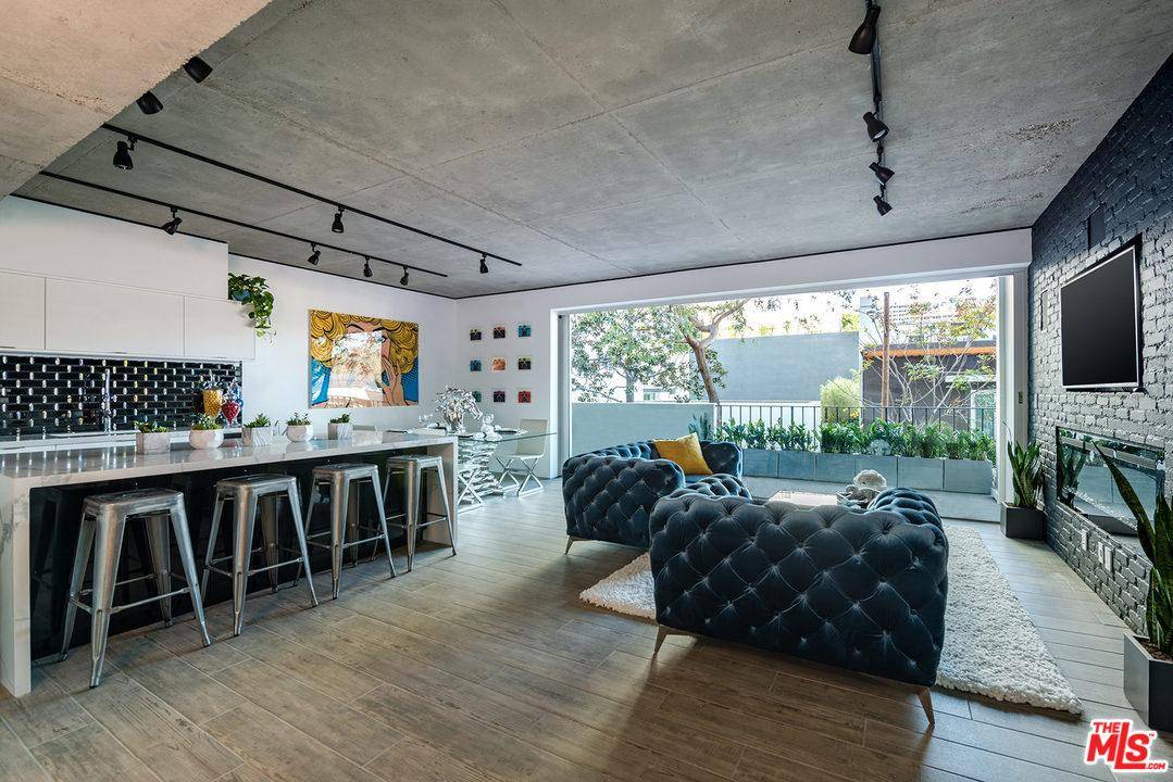 Completely Reimagined and Furnished Modern 2 bedroom 2 bathroom in the highly sought out Doheny Plaza