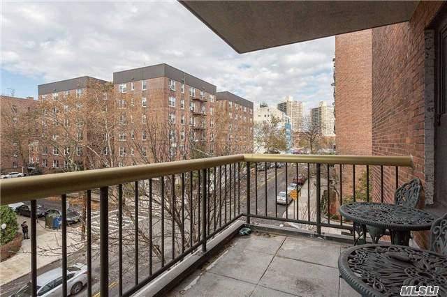You Must See This Very Large 2 Bedroom 2 Bath Coop W/Terrace In A Modern Doorman Building In Heart Of Forest Hills.