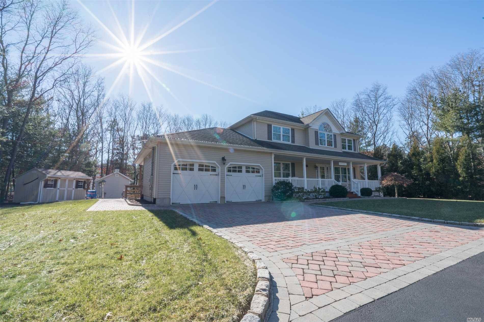 Nestled Away On A Quiet Treed Lane Lies This Amazing Turn-Key 4 Bedroom, 2.