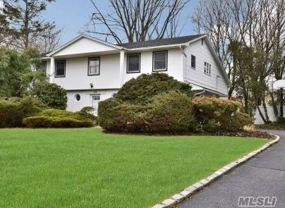 Splanch Style Home Sits In Famed Commack Schools In The Sought After East Northport Area.