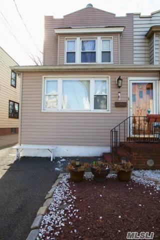 Two Family Home Close To Middle Village/Ridgewood Border.
