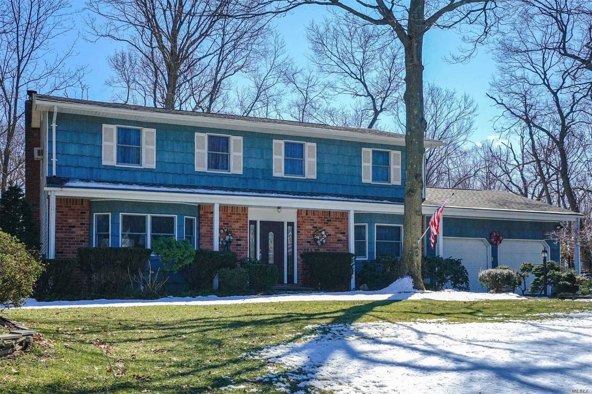 Spacious 4 Bedroom Colonial W/Updated Kitchen, And Baths.