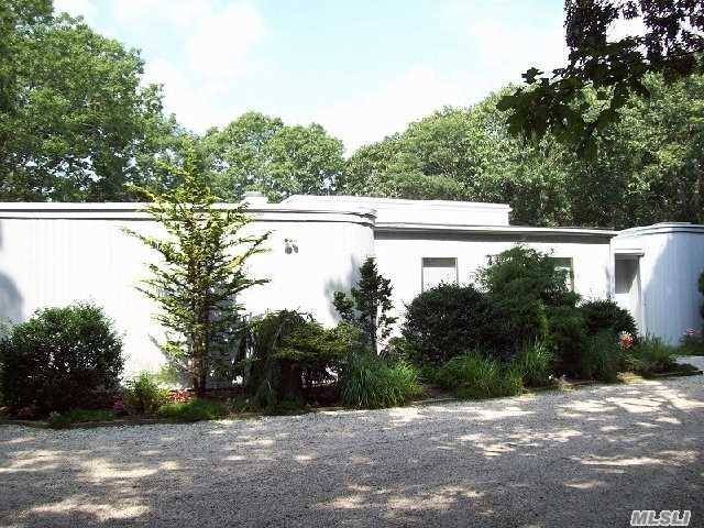 This Bright, Spacious Contemporary Is Situated On Nearly 1 Acre.