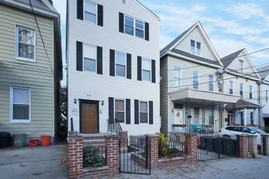 Beautiful street in weehawken two bedroom two bath basement apartment share laundry ults included