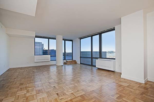 No Broker Fee + 2 Months Free Rent!!!   Limited Time Only!!!   Chic Chelsea 3 Bedroom Apartment with 3 Baths featuring a Rooftop Deck and Fitness Center