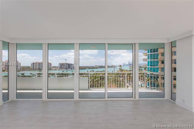 BRAND NEW NEVER LIVED IN RENOVATED CORNER UNIT WITH WRAP AROUND BALCONY