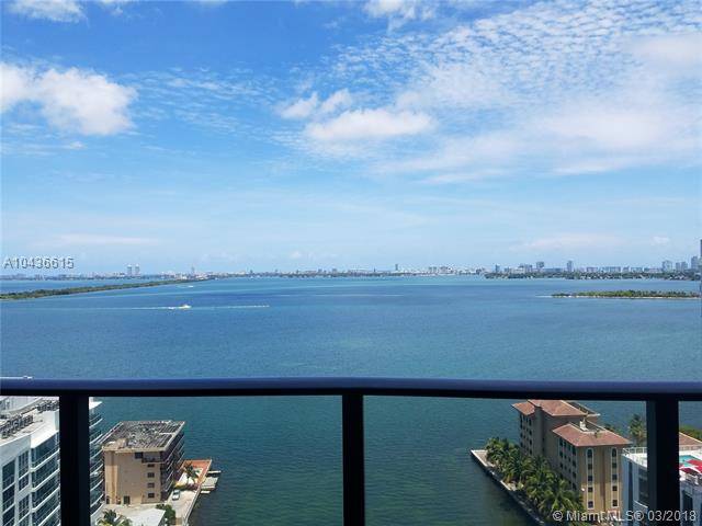 Breathtaking views from this 2BR/ 2BA + Den Bay front unit