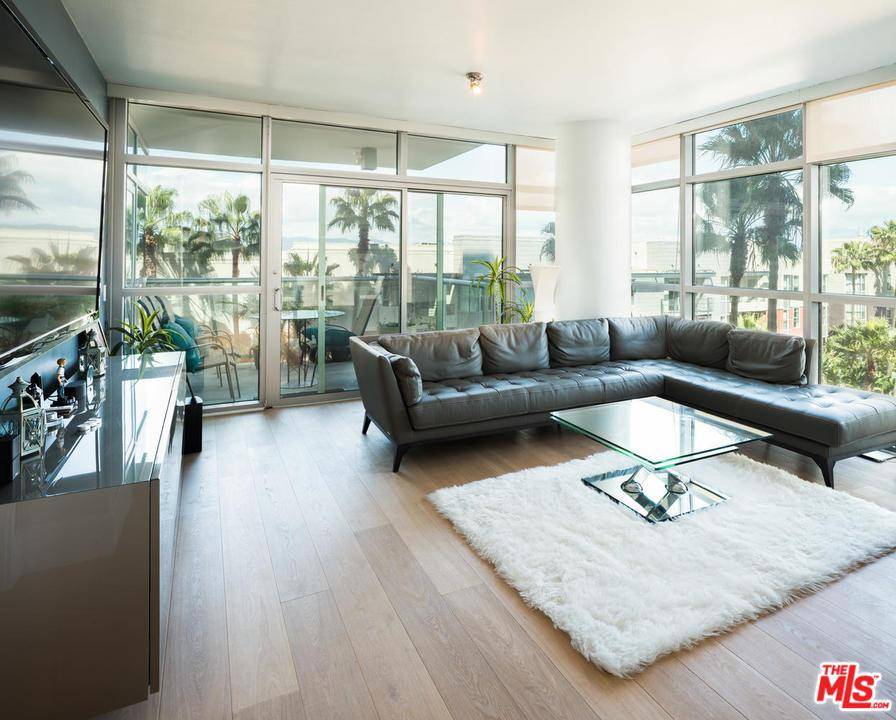 Stunning state of the art 2 bed/2 bath + office corner unit in the Cove- Unit boasts an open floor plan with city & mountain views