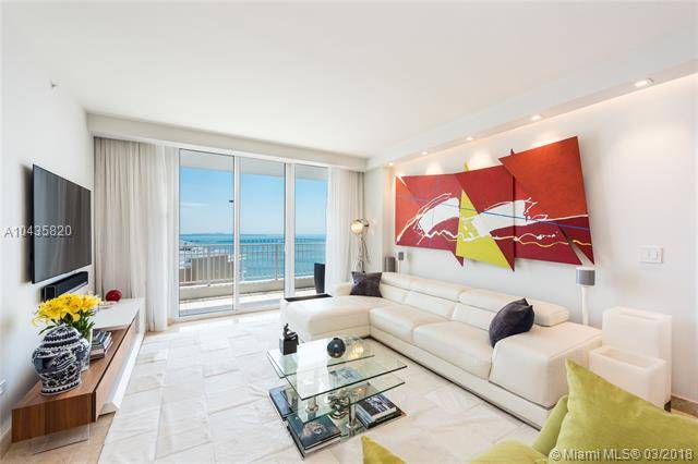 This Exquisitely updated unit with high-end finishes offers mesmerizing direct ocean views