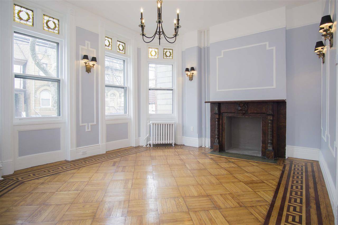 Historic charm meets modern upgrades with this beautifully restored 3BR+den apartment nestled between Journal Square and downtown Jersey City
