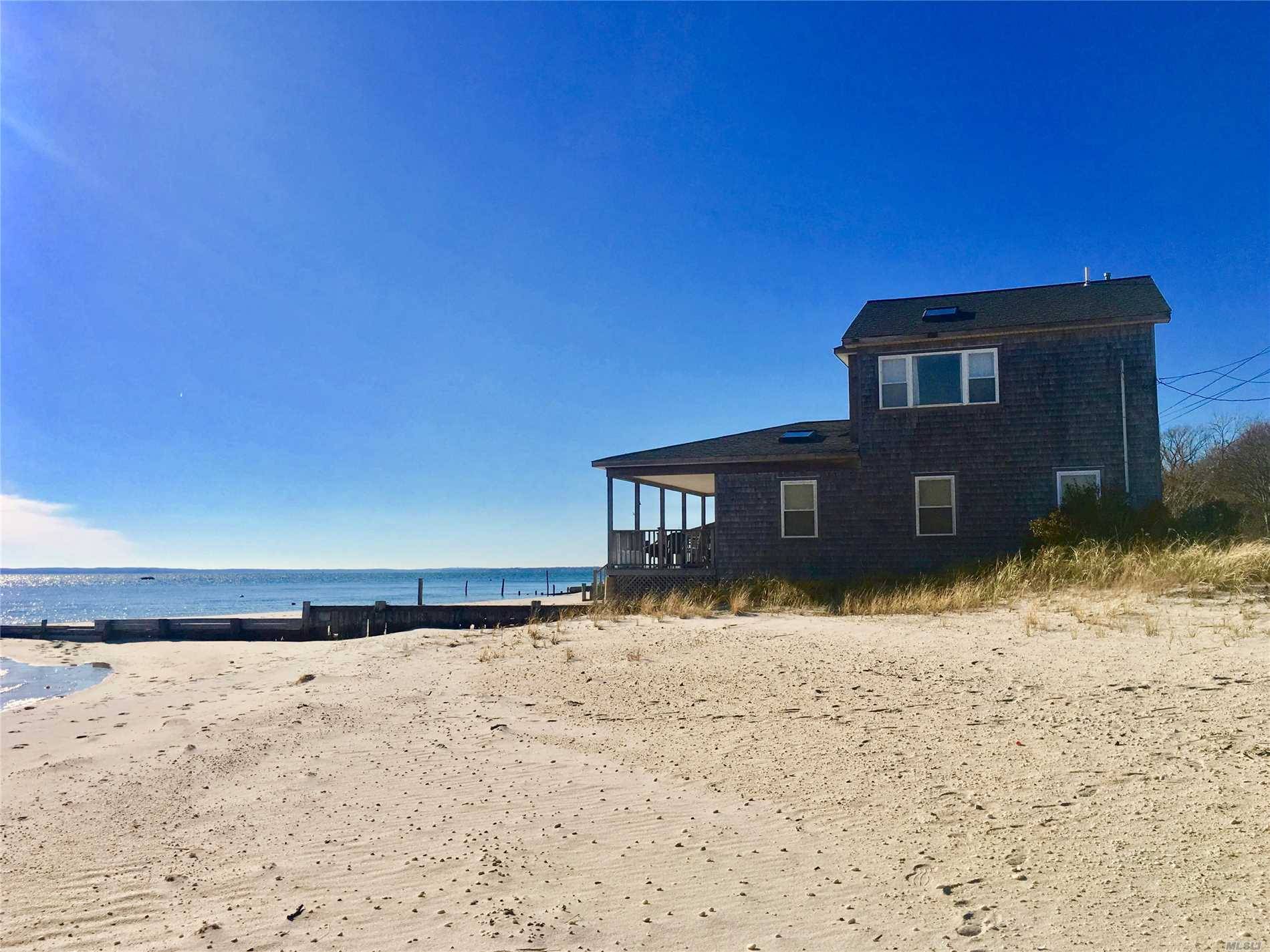 Classic North Fork Beach House In Highly Sought After New Suffolk With Private Sugar Sand Beach.