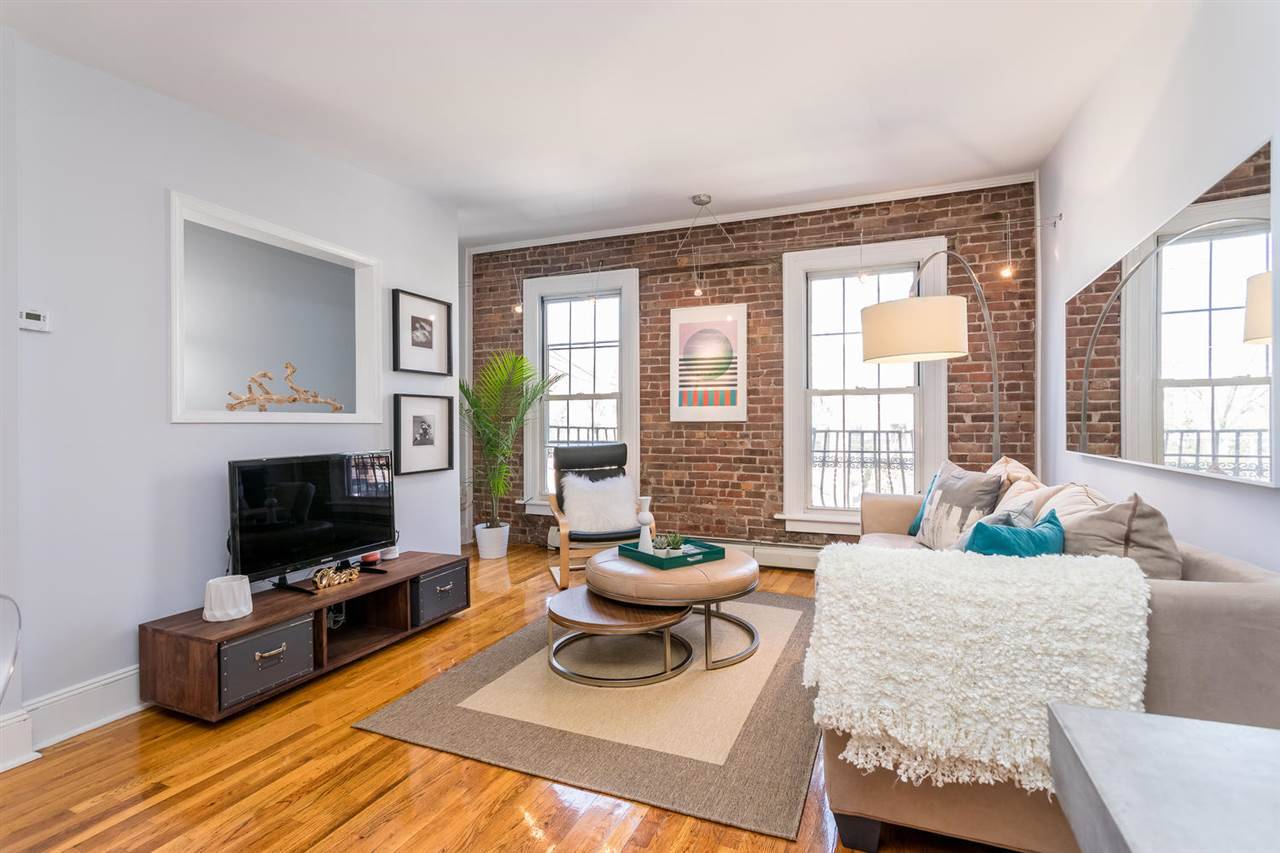 A rare opportunity to live in the heart of Hoboken facing Church Square Park