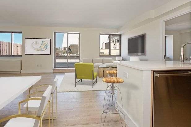 Charming West Village 2 Bedroom Apartment with 2 Baths Featuring a Roof Deck & Gym