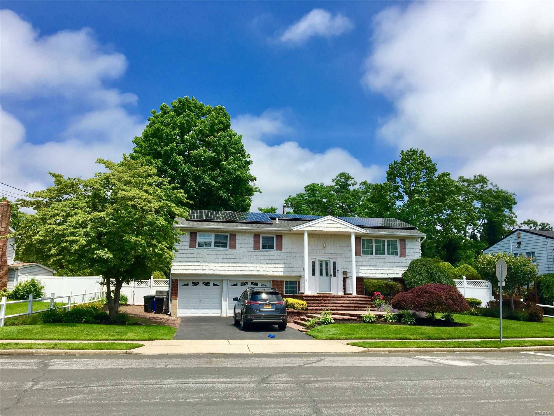 Gorgeous Home In One Of Li's Tops School Districts W/ Solar Power, New Kitchen W/Quartz Counter-Tops, Blk Stainless Appliances And Plenty Of Cabinets.