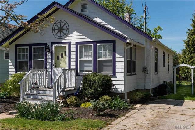 Greenport Seasonal Two Bedroom Mid-Century Cottage With Cheery Rooms, Period Decor, Outdoor Shower, And Rear Deck.