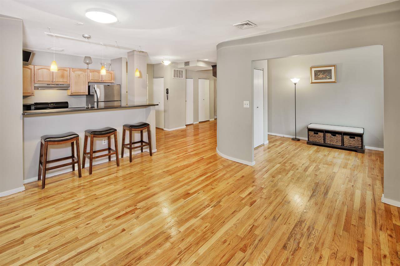 Modern flair blends with Timeless appeal in this Tastefully updated 2 Bedroom 1 Bath condo