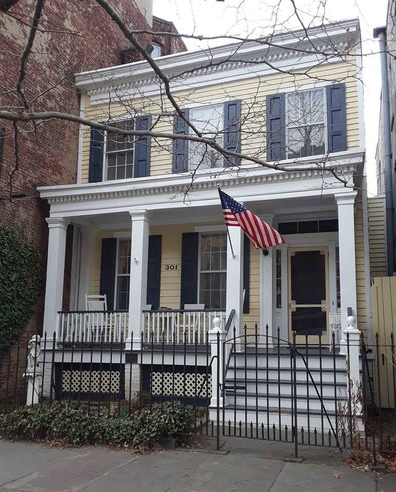 Rare opportunity to own a spectacular historic greek revival house on Grove St
