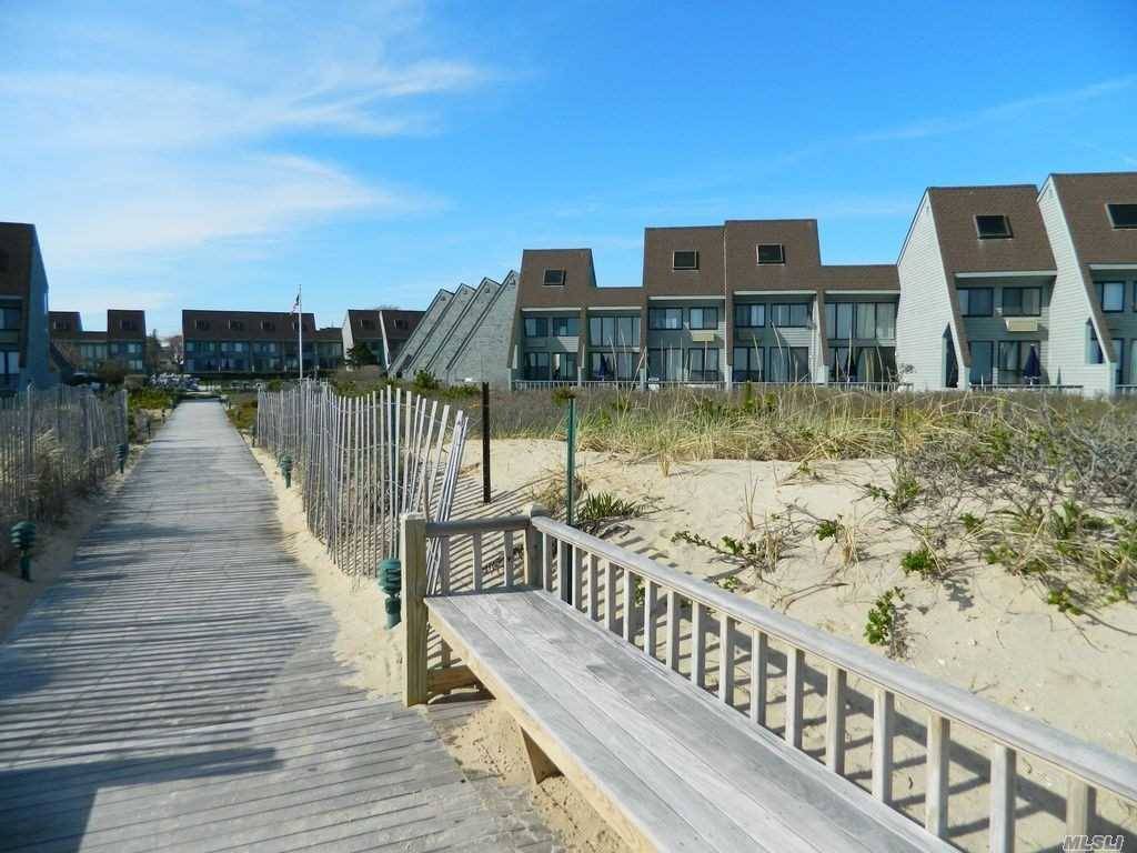 Two Story Ocean Front Co-Op In Montauk's Desirable Surf Club Resort.