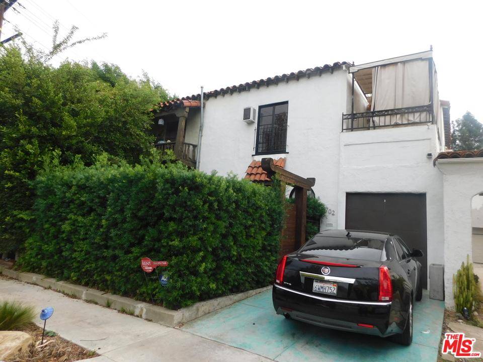 This is a Spanish 2 story Townhouse - 3 BR Townhouse Beverly Grove Los Angeles