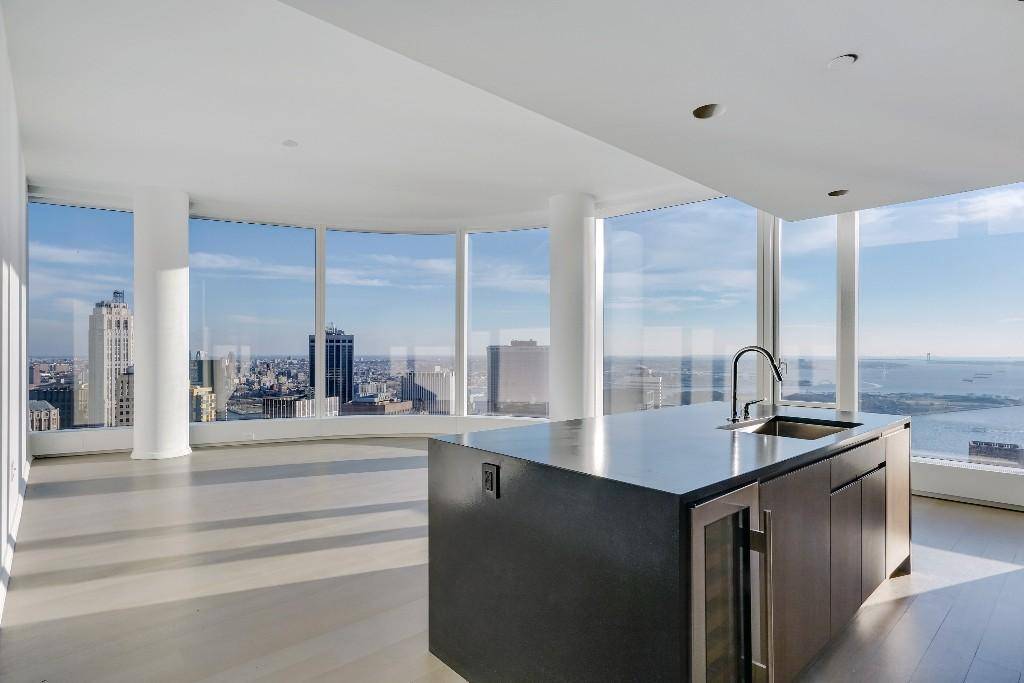 No Broker Fee!!!   Limited Time Only!!!    Exquisite Financial District 4 Bedroom Apartment with 4 Baths featuring a Rooftop Deck and Pool