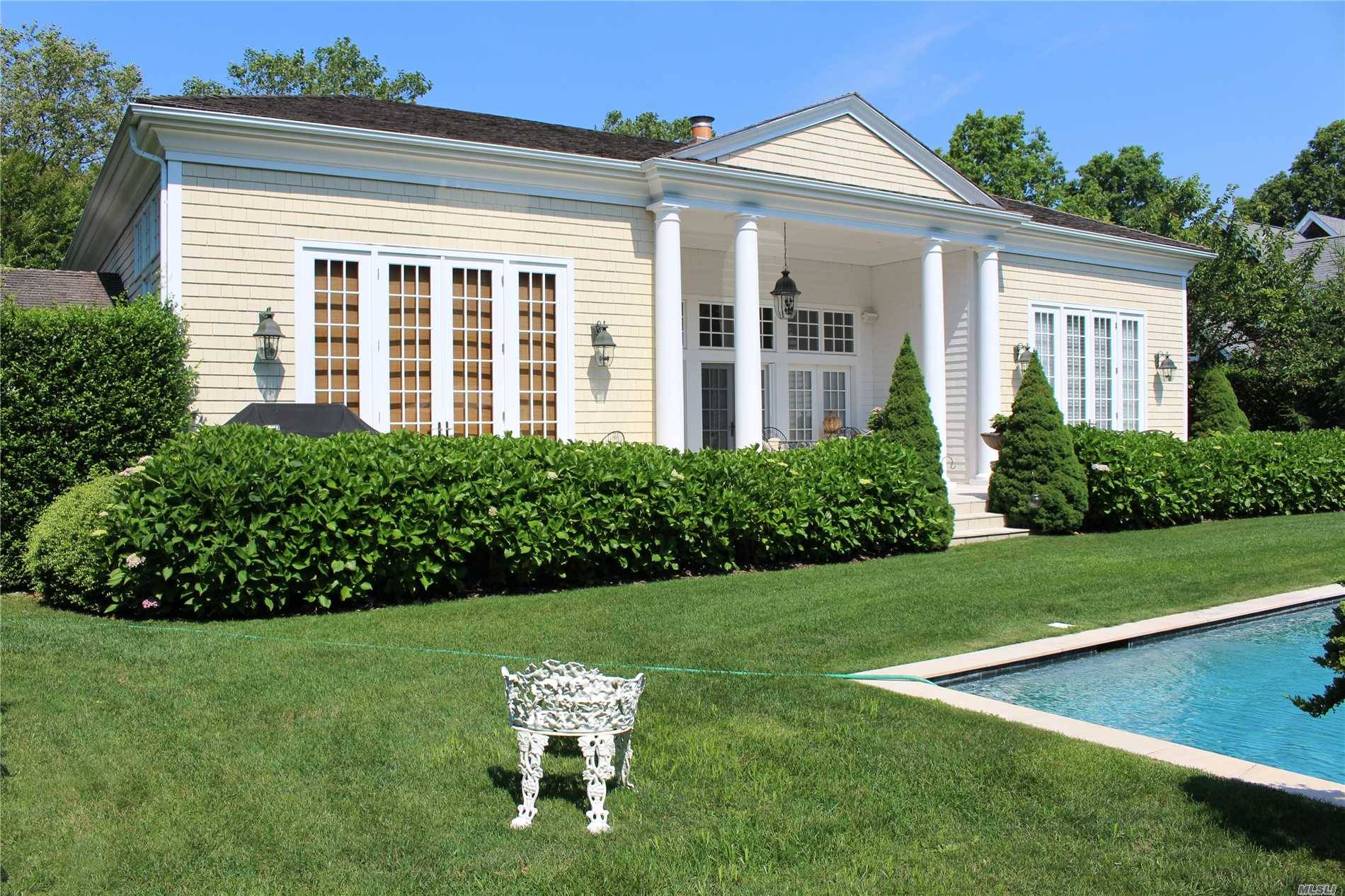 Formal Gardens And Limestone Patios And A Heated Pool Surrounded With Matured Landscaping For Additional Privacy.