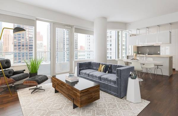 1 Month Free Rent!!!    Limited Time Only!!!   Beautiful Midtown East 3 Bedroom Apartment with 3 Baths featuring a Fitness Facility and Rooftop Terrace