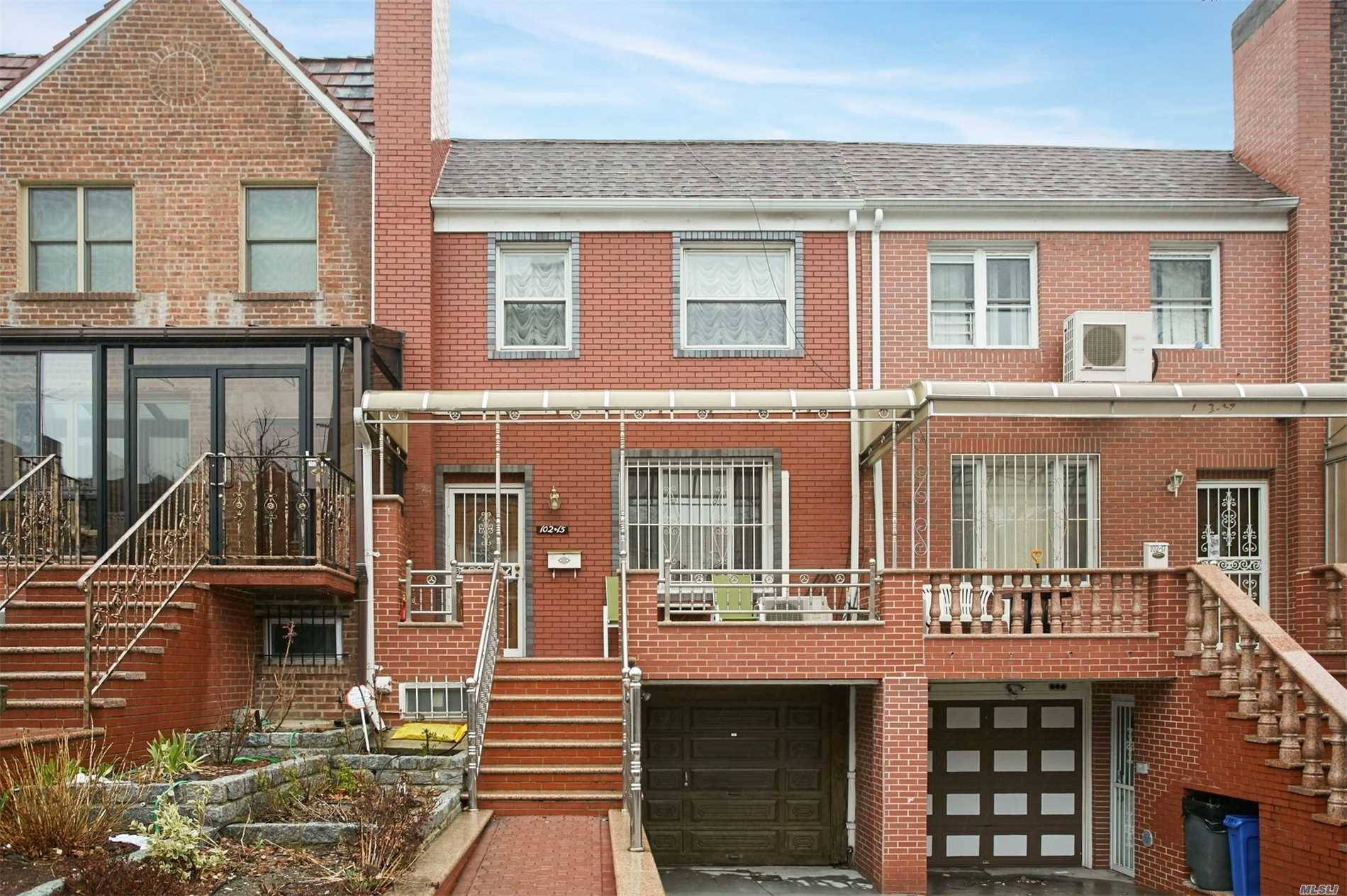 Fully Renovated Brick House In Forest Hills Featuring Large Living Rm,Formal Dining R, With High Ceilings And Hardwood Floors.