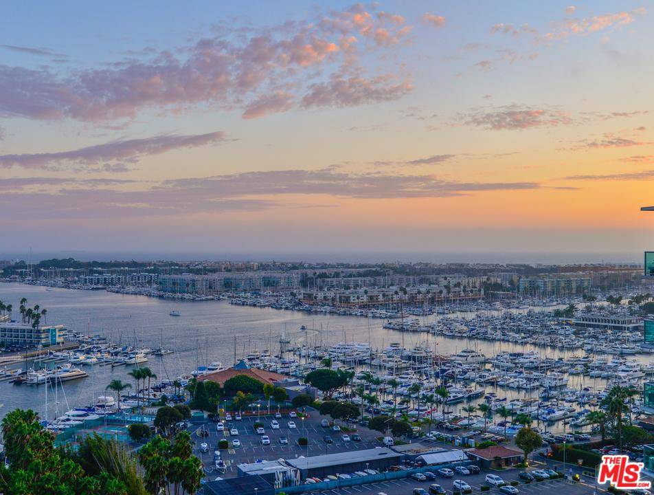 SAVOR INCOMPARABLE MARINA VIEWS FROM THIS ULTRA-SPACIOUS 1