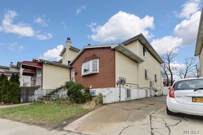 Centrally Located Across The Street From Roy Wilkins Park, This Is A 2 Family 6 Bedroom House.