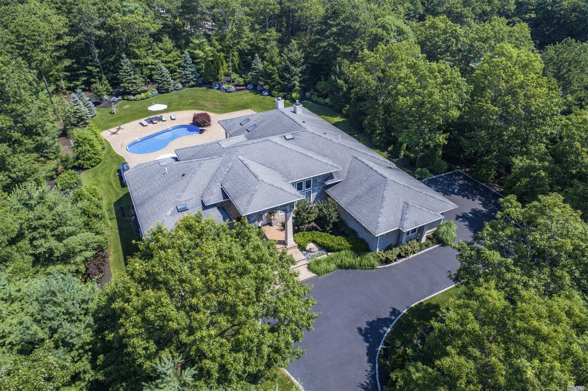 This Beautifully Updated Smart Home In Southampton Township Is Surrounded By Walls Of Glass And Exquisite Architectural Details And Design.