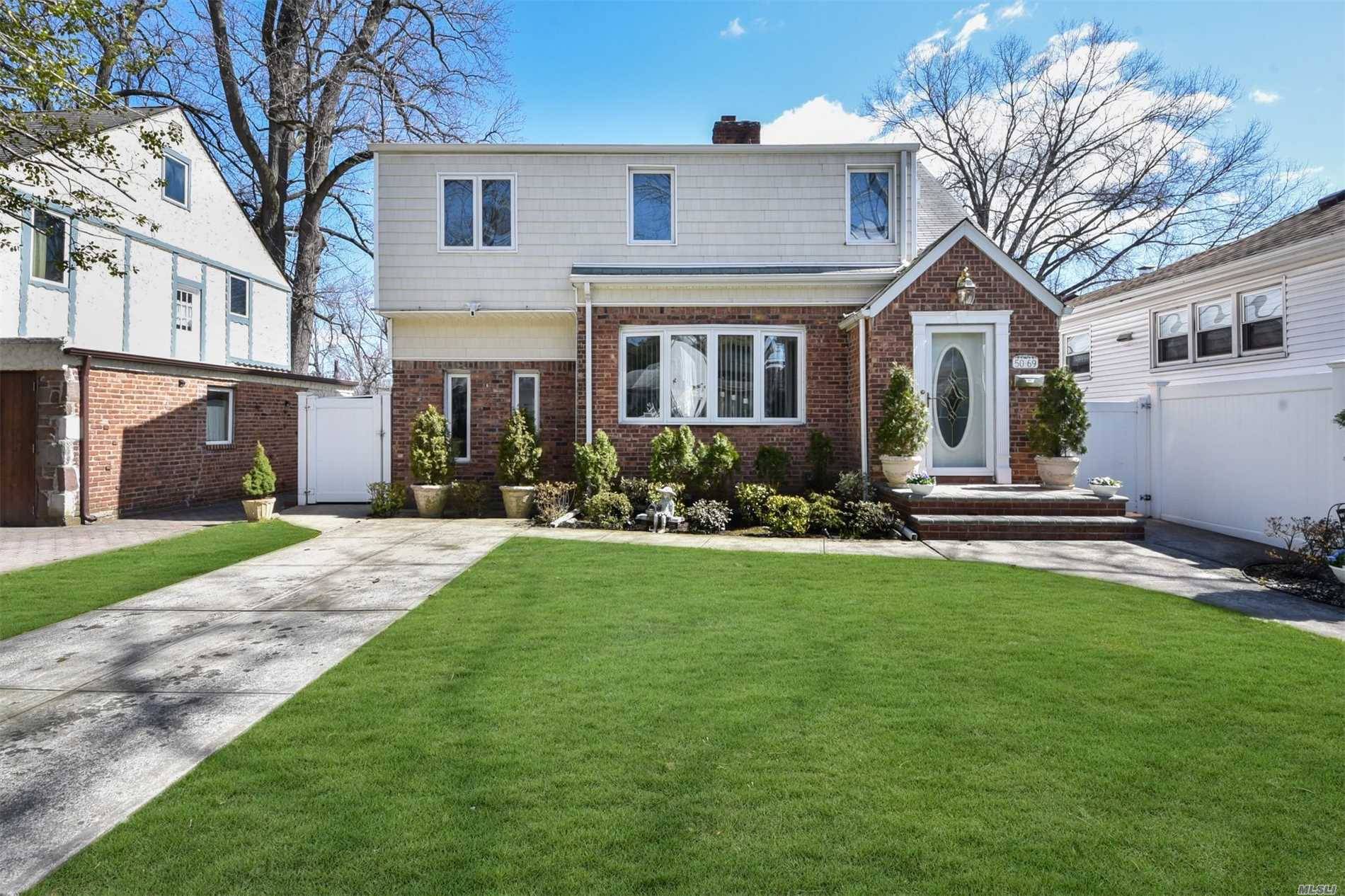 This Pristine Home, Located On A Quiet, Tree Lined Block In Douglaston, Ny, Is One Not To Be Missed.