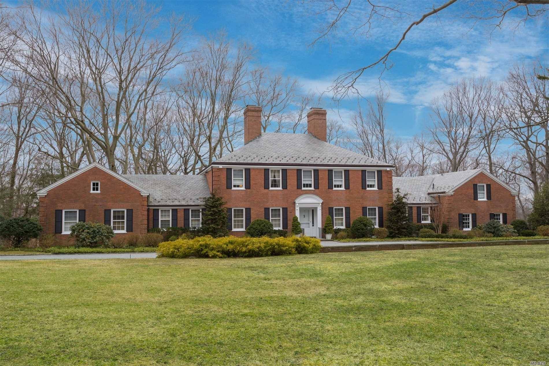 Traditional Custom Built 1968 Brick Manor Home Tucked Away On 5 Tranquil Mill Neck Acres With Pool.