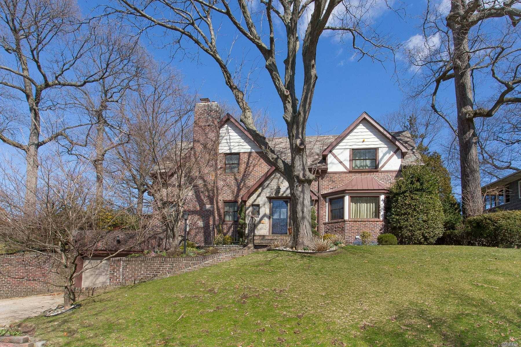 This Sprawling And Unique Tudor Center Hall Colonial Is Unlike Any Other Home In Jamaica Estates!