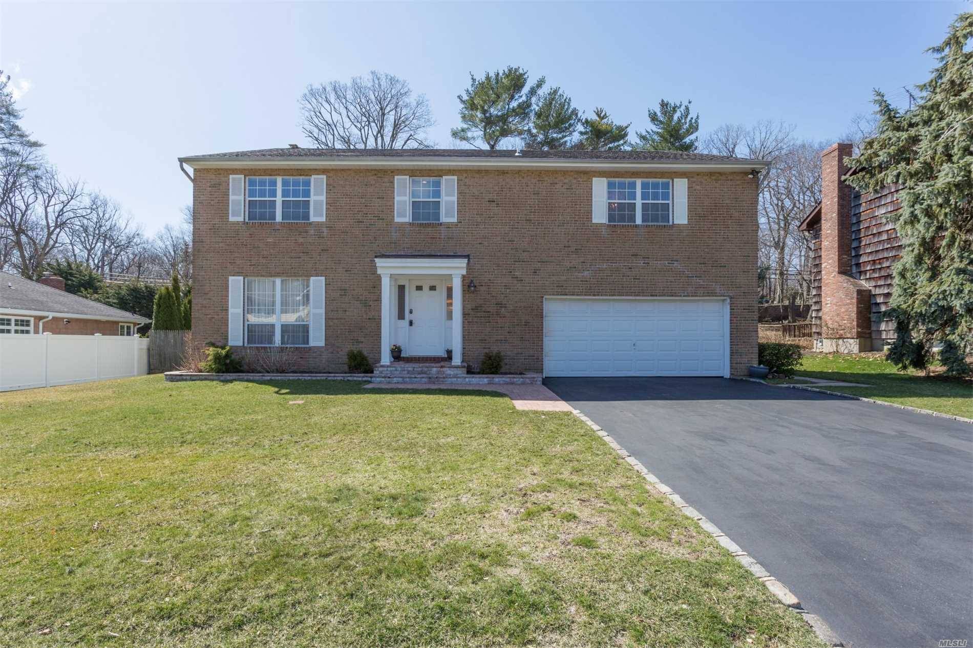 Beautifully Maintained Oversized 5 Bedroom Center Hall Colonial In Prestigious Waterfront Community.