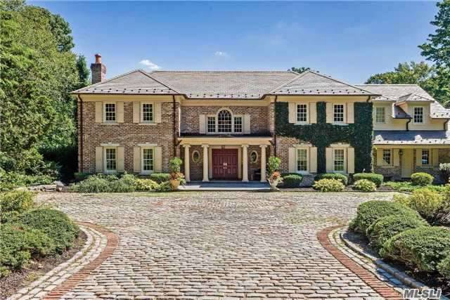 Impressive Gated Entry & Long Drive Leads To This Stately Brick Manor Home,6900 Sq Ft & Sited On Over 5 Lush Acres In Prestigious Matinecock.