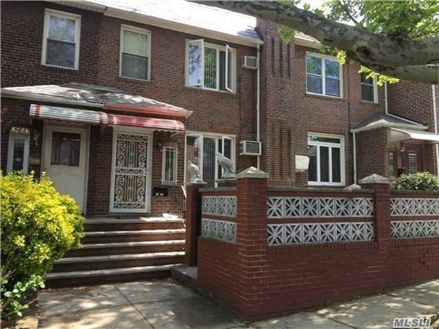 Fully Rebuilt Attached House In The Heart Of Hillcrest/ Fresh Meadows With A Brick Front & Back Yard.