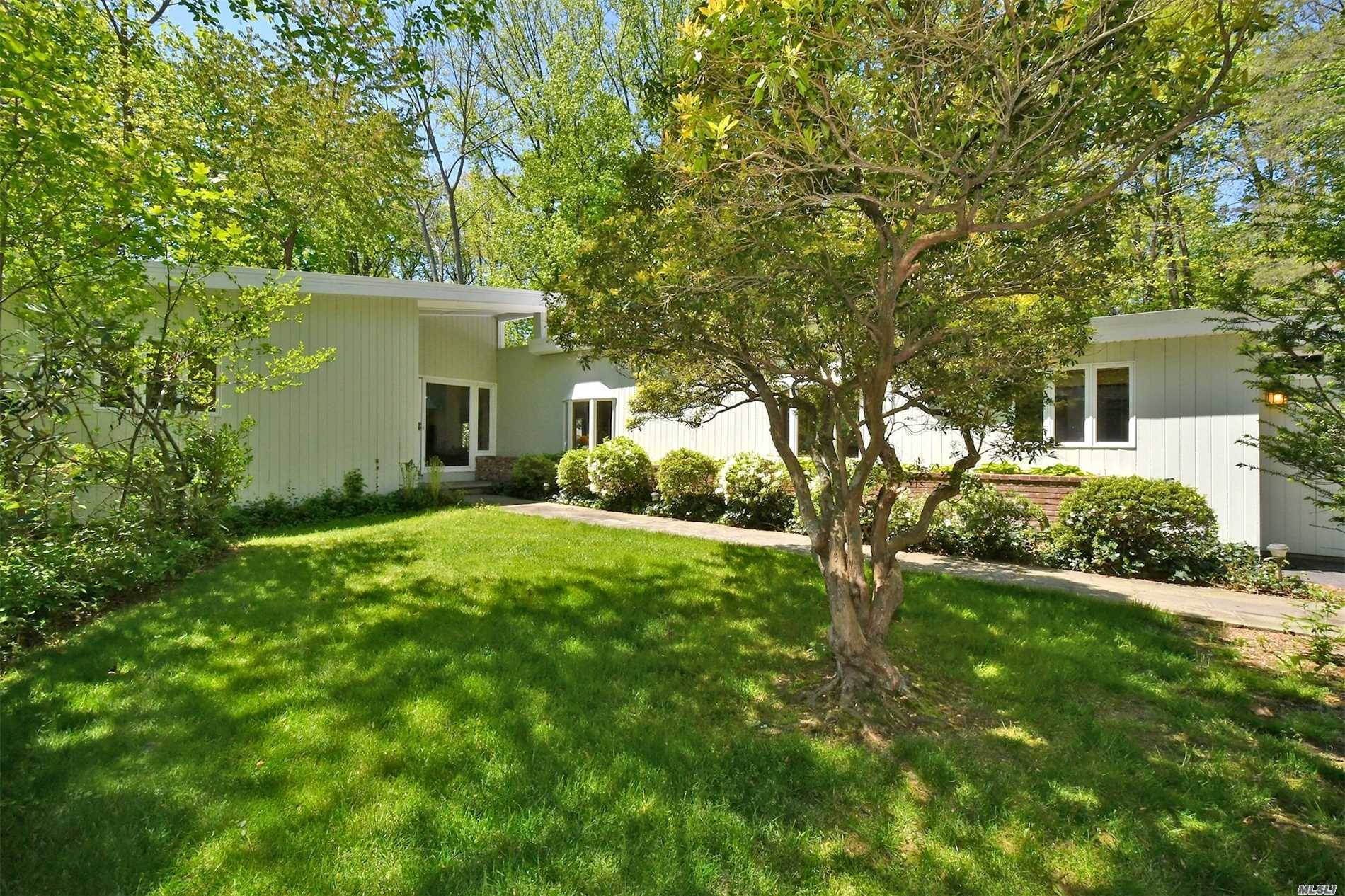 Nature & Privacy Surround This Quintessential Lloyd Harbor Mid-Century Modern 3/4 Bed Exp Ranch On Pvt Rd Leading To Beach W/Mooring Rights.