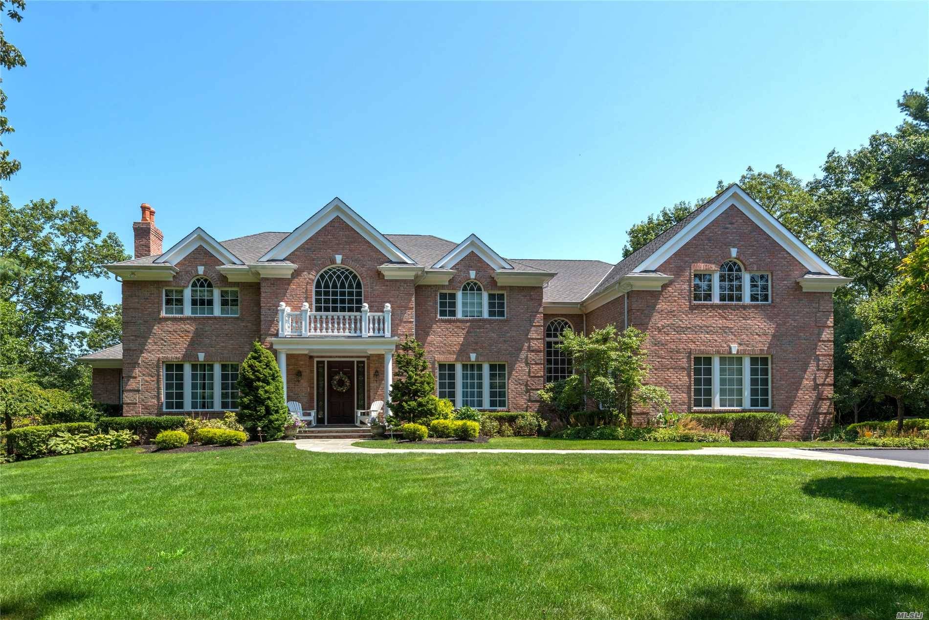 Impressive All-Brick Colonial Desirably Situated At The End Of A Cul-De-Sac On Shy 3 Acres Backing Stillwell Preserve.