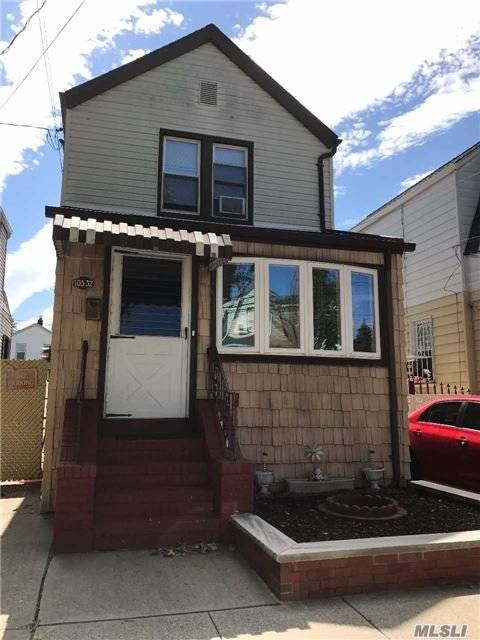 Detached One-Family Home 2 Bedroom, Living Room, Separate Dining Room, Eat In Kitchen, Partially Finished Basement, Backyard, Garage.