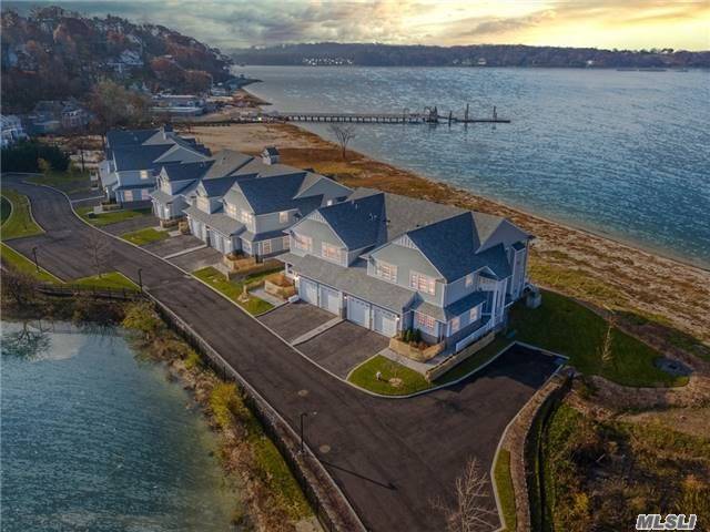 Extraordinary  Design And Contemporary Luxury Describes This Waterfront Townhouse W/Spectacular Views Front And Side .