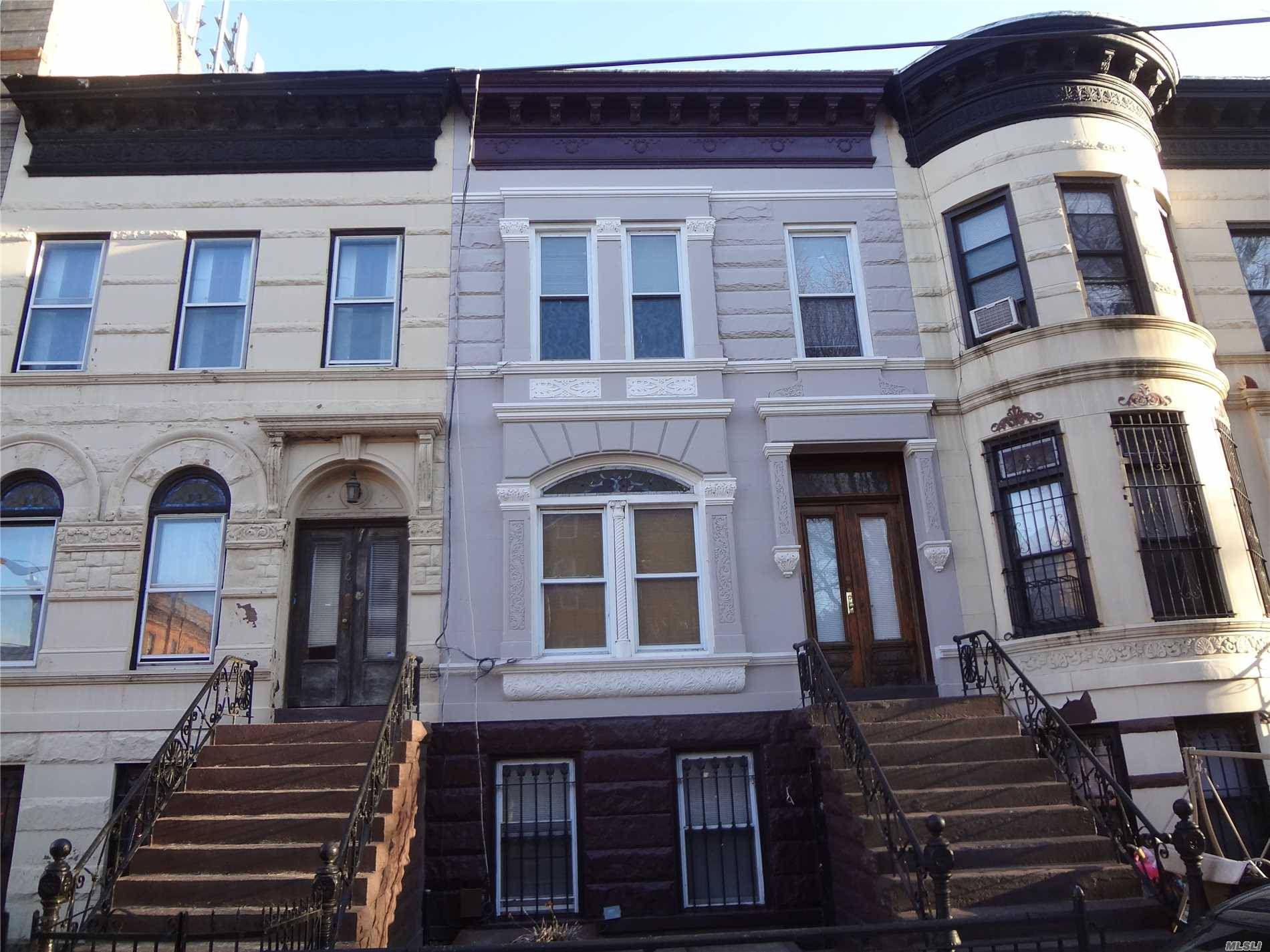 Brownstone Three Story, Two Family With Basement And Garden.