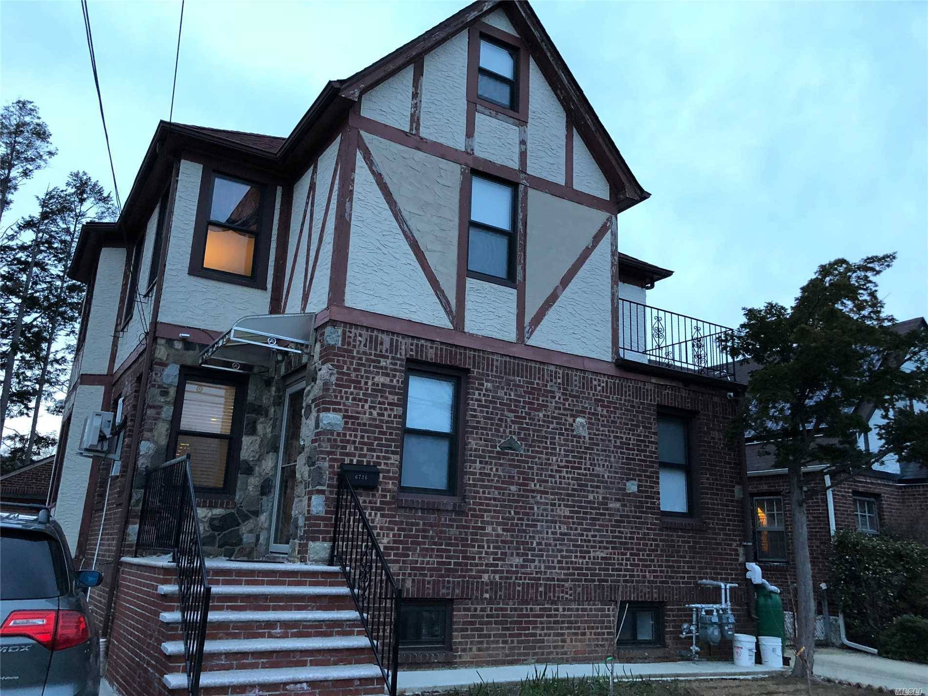 Beautiful 2 Family Brick Home Located In The Heart Of Fresh Meadows.
