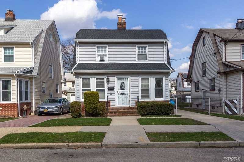 Come Check Out This Charming Colonial Gem In The Heart Of Queens Village.