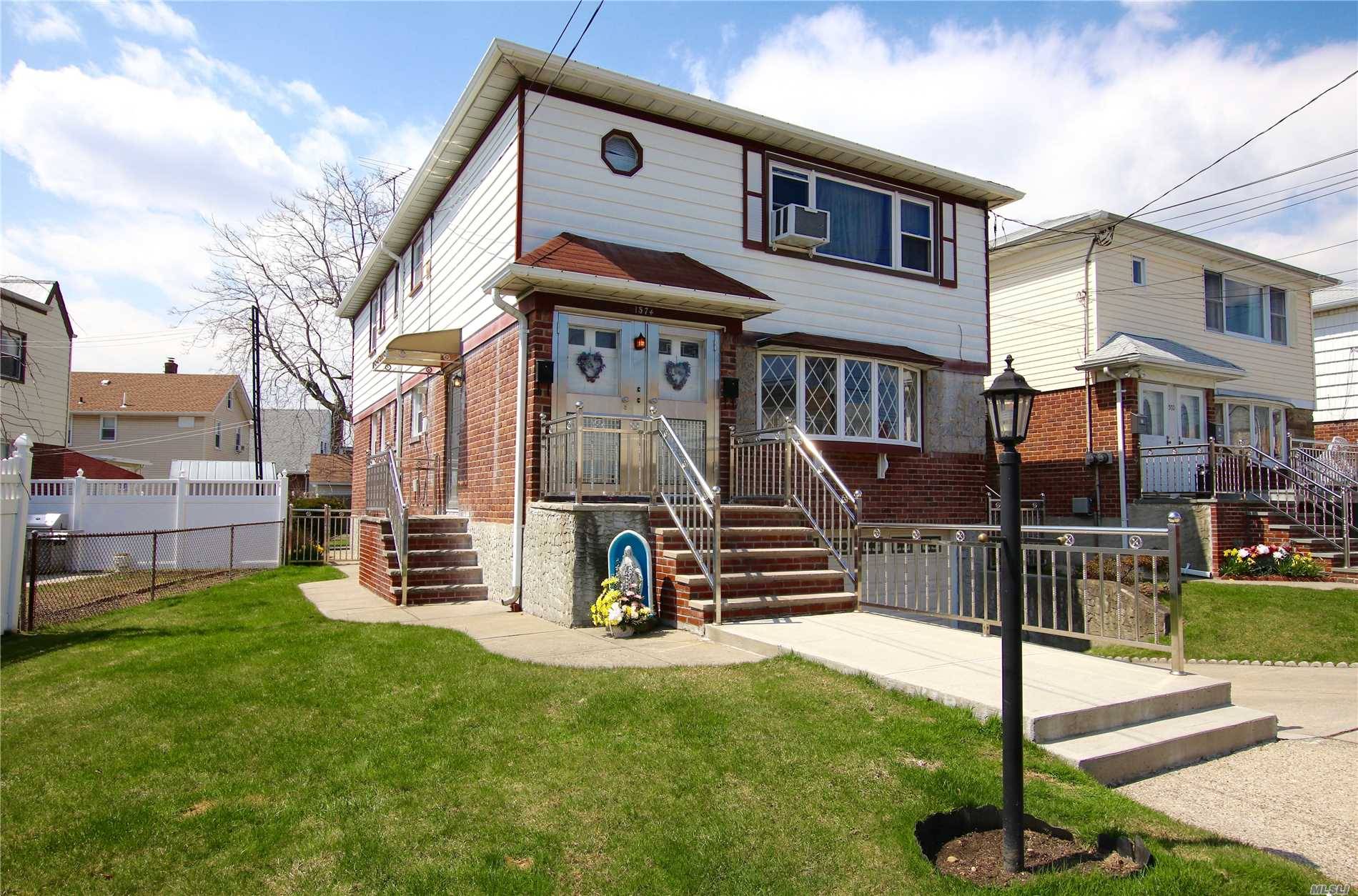 Well Maintained 2-Family Home In The Desirable Whitestone.