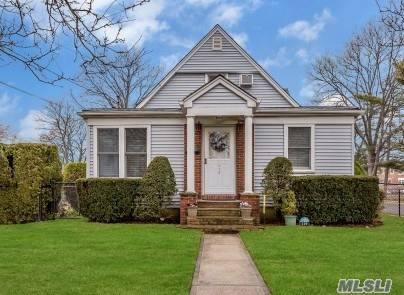 Beautifully Maintained Cape With Wonderful Curb Appeal!
